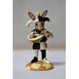 A Royal Doulton Bunnykins figure of a Jester in black and white costume prototype figure, 10.5cm