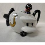 A Carlton Ware novelty Teapot modelled as a Golly flying a Bi Plane, Trial colourway, stamped