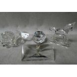 Swarovski Crystal: a single Rose, boxed, 8cm long, a Rocking Horse, boxed, 7cm long, a small