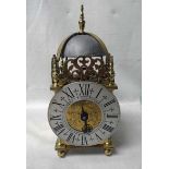 A 17th century style Brass Lantern Clock, Edward Norris London, bell striking weight driven