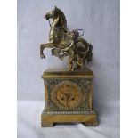 A 19th century French Brass Figural Mantel Clock, surmounted by a winged cherub alongside a