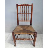 A 19th century spindle back rush seat Stand Chair, top rail with central sunburst, turned