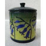 Sally Tuffin Dennis China works, a lidded circular jar, tubeline decorated with Bluebells on a