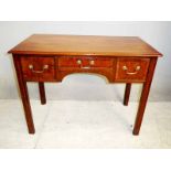 A George III mahogany Lowboy, moulded edge rectangular top over three small cross banded drawers