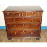 An 18th century mahogany and cross banded Chest of Drawers, moulded edge rectangular top above an