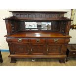 A large Arts and Crafts mahogany Mirror Back Sideboard by Jas Shoolbred & Co., narrow moulded canopy