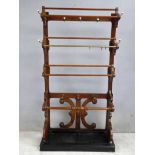 An imposing Victorian oak Hall Stand, three fret work garment rails with oak and brass bars,