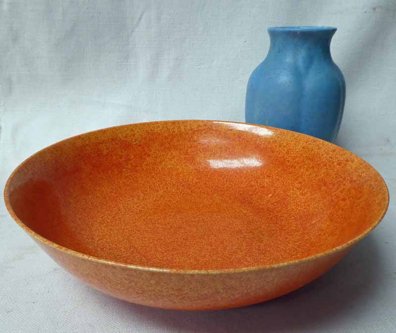 A large Pilkingtons Royal Lancastrian Fruit Bowl, number 3192, mottled orange glaze internally and