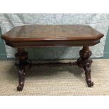 A Victorian mahogany Library Table, canted rectangular top, moulded edge, over a moulded edge