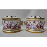 A pair of Lynton porcelain Ram's Head Bough Pots, semi-circular form with pierced covers, hand