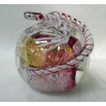 A Michael James Hunter Twists Glass Studio Paperweight, silver and gilt abstract shapes among