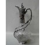 A fine Victorian etched glass Claret Jug, typical form with silver plated mount to neck with