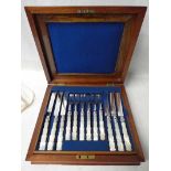 A good quality Victorian Canteen of Dessert Cutlery, silver forks and knives with mother of pearl