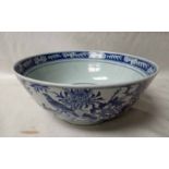 A large Chinese 19th century Blue & White Bowl, externally decorated with birds amongst peonies