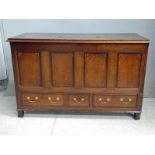 An early 19th century oak Lancashire Mule Chest, moulded edge rectangular top altered to create