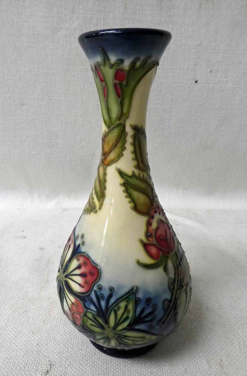 A modern Moorcroft pottery Vase, slender neck baluster form, tubeline decorated in the Sweet Briar