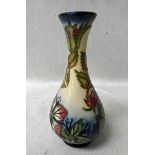 A modern Moorcroft pottery Vase, slender neck baluster form, tubeline decorated in the Sweet Briar
