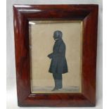 An early 19th century mahogany framed Silhouette of an eminent gentleman in profile dressed in frock