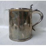 A large early 20th century silver Half Gallon Tankard, circular form, hinged raised lid with