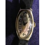 A ladies early 20th century 18ct gold cased Wrist Watch, signed Arva to the oval mother of pearl