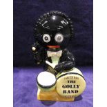 A Carlton Ware Golly Band Drummer in Special Colourway, 19cm high