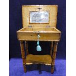 An early 20th century Burr Maple Ladies Necessaire, hinged rectangular top with faux bamboo edge,