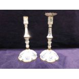 A pair or 18th century Staffordshire enamel Candlesticks, decorated with blue flowers on white