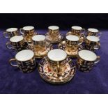 A set of twelve early 20th century Royal Crown Derby Coffee Cans and Saucers, pattern number 2451,