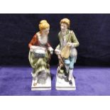 A pair of 20th early modern Sitzendorf figures as a courting couple, each 26cm high