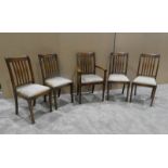 Three Oak Dining Chairs with Hepplewhite style backs comprising four Side Chairs and Carver Chair (