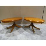 A good quality pair of rosewood occasional tables, oval line inlaid tops with moulded edge, on