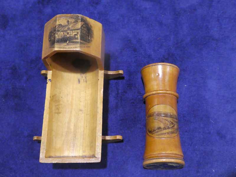 A Mauchline Ware Llandudno two-piece Needle Holder, 9cm long and an Anne Hathaway's Cottage