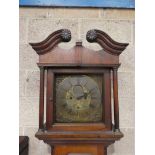 A late 18th century oak Longcase Clock, broken arch pediment with carved rosettes, 12 square brass