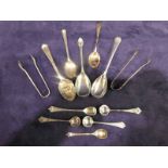 A selection of silver small work, ten small spoons and two pairs of sugar nips, 5.51oz (12)