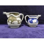 Two early 19th century Staffordshire caneware jugs decorated with Dolphin spout, trailing body