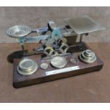 Brass Postal Scales by S Mordan & Co., engraved with postage rates, 27cm by 14cm by 13cm