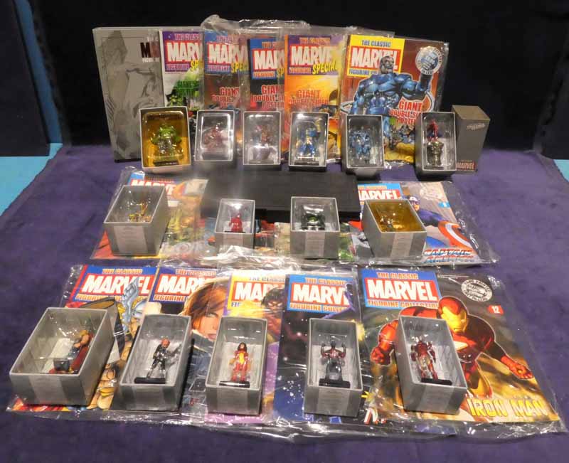 An extensive collection of Marvel Eagle Moss Superhero Magazines and lead figures comprising: issues