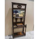 An early 20th century mahogany Hall Stand incorporating five metal coat hooks, around a