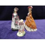 Two early Royal Doulton Figurines, HN1739, The Paisley Shawl, one with six areas of glaze missing,