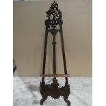 A carved mahogany Display Easel for notice board or menu board with adjustable shelf 60cm by 88cm by