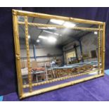 A gilt frame Mirror with inner lattice in gilt bars with corn husks, central mirror bevel edged,