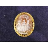 A Shell cameo brooch set in gilt metal decorated with engraving and applied decoration