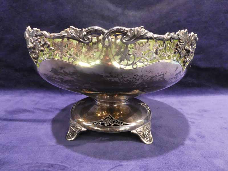 A George VI silver Fruit Bowl, circular with openwork, grapevine decoration on circular four-