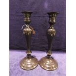 A pair of bronzed metal Candlesticks, 20th century of turned form, 36cm high