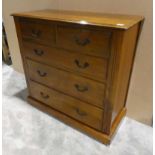 Chest of Drawers in cherry wood with 2 two drawers over three long on plinth base, 104cm by 49cm