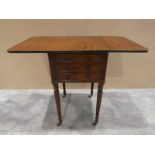 A Regency Gillows style mahogany Writing/Work Table, rounded rectangular drop flap top above a