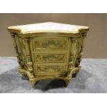 A French gilt and cream corner chest with inset white marble top with four feature columns extending