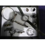 A silver cased early 20th century Wrist Watch and twelve items of white metal jewellery including