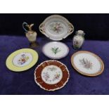 Seven items of late 19th/early 20th century porcelain, all hand painted with flowers, most by