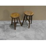 Two Victorian oak Stools with turned legs and cross stretchers, one stool 52cm high, second stool